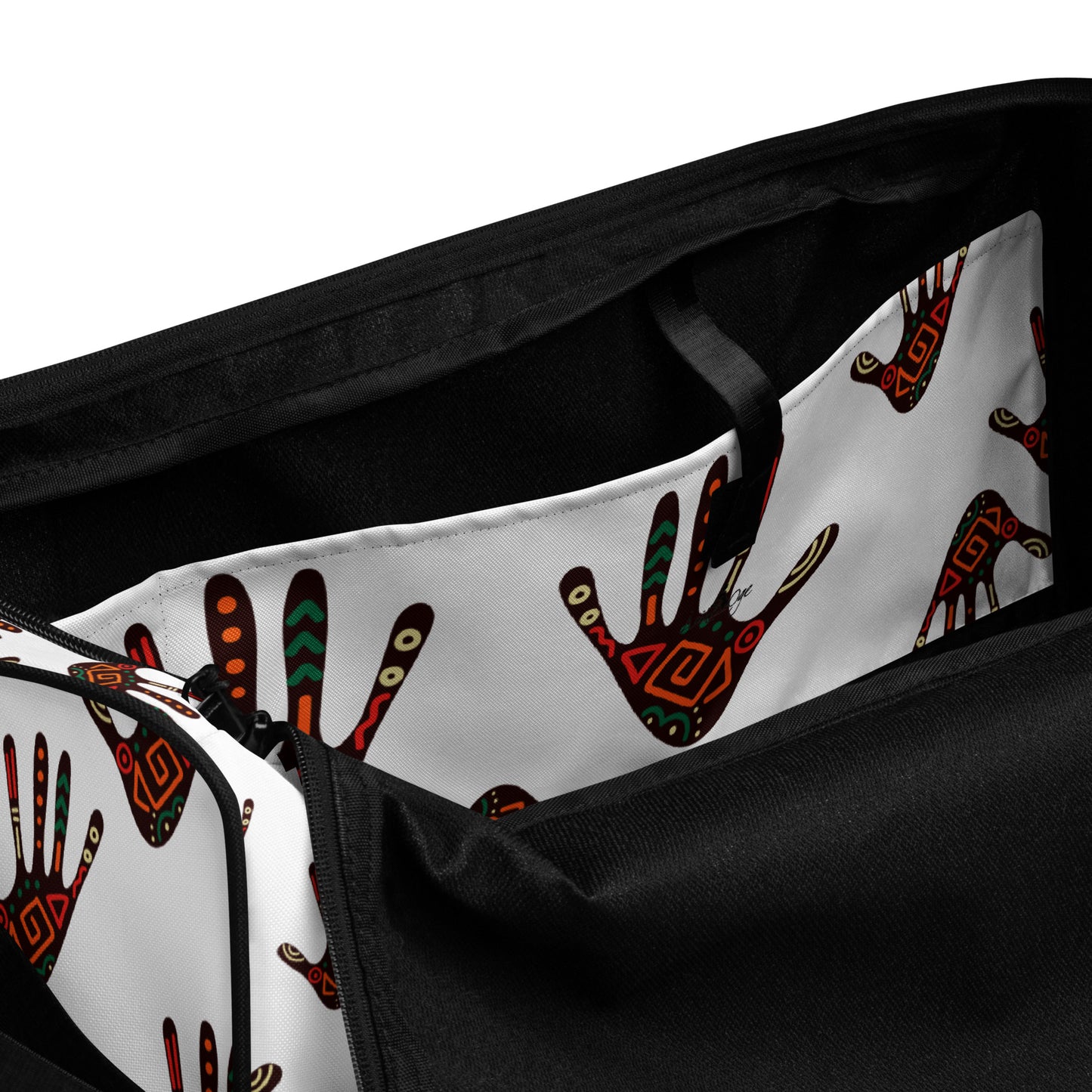 Spacious inside side pocket of Duro duffle bag; clothed in the custom Tribal Palm Print on white background.