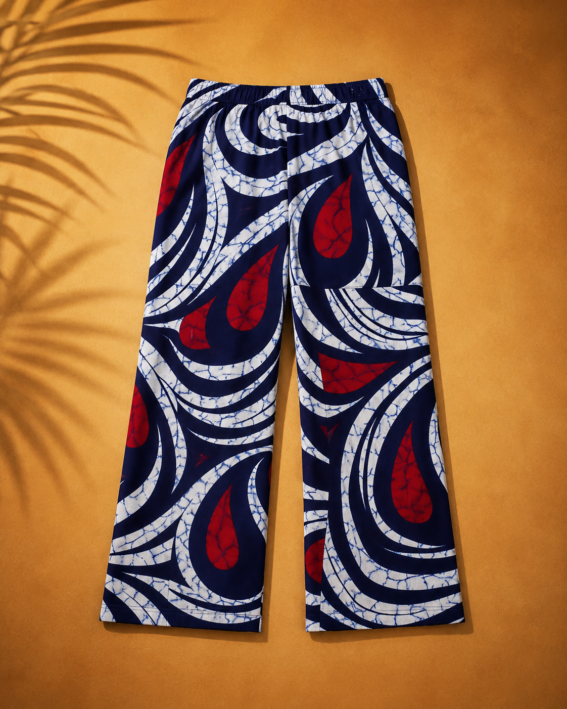 Patterned pants on a mustard yellow background