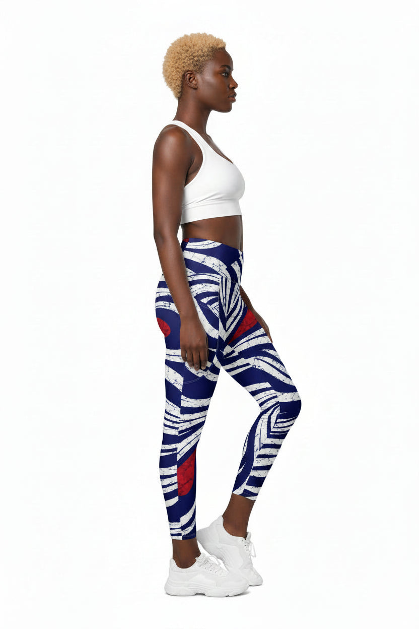 Woman wearing OMI African print crossover leggings for Juneteenth festival 