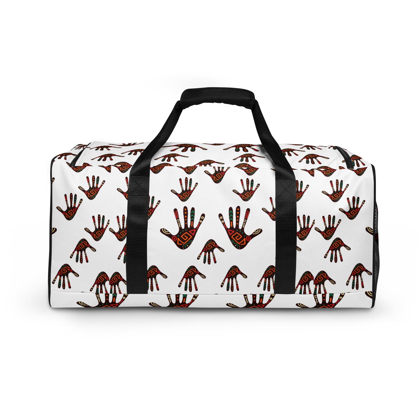 Side view of a white duffle bag, covered with a colorful tribal palm print design, featuring multiple pockets, a black adjustable padded shoulder strap, and dual padded handles.