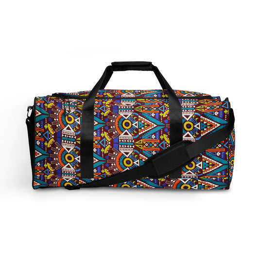 A colorful Aztec print duffle bag with black interlining, featuring a geometric pattern, dual padded handles, and an adjustable padded shoulder strap.