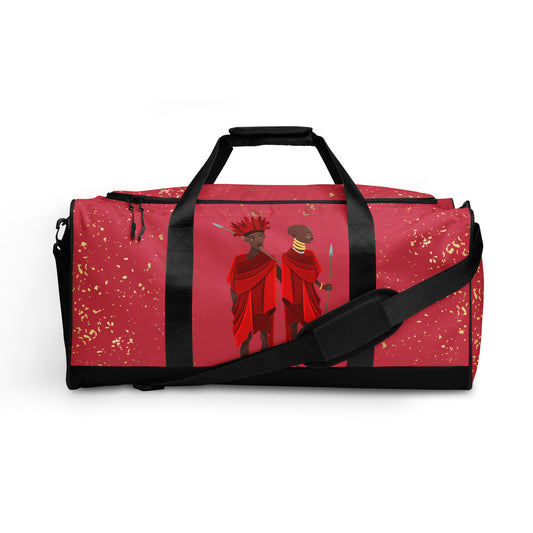  Front view of Agojie Opal Duffle bag showing the dual small carriers strapped up, while the longer single strap is dropped down and across the front of the bag.