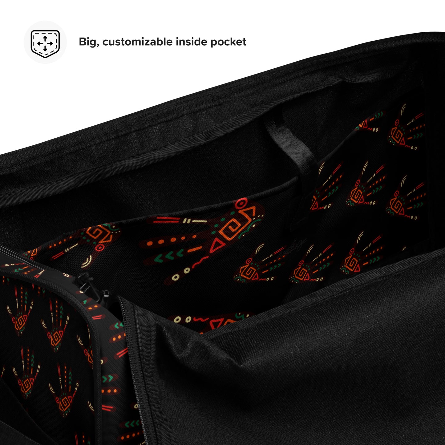 Spacious inside side pocket of Duro Midnight duffle bag; clothed in the custom Tribal Palm Print on black background.