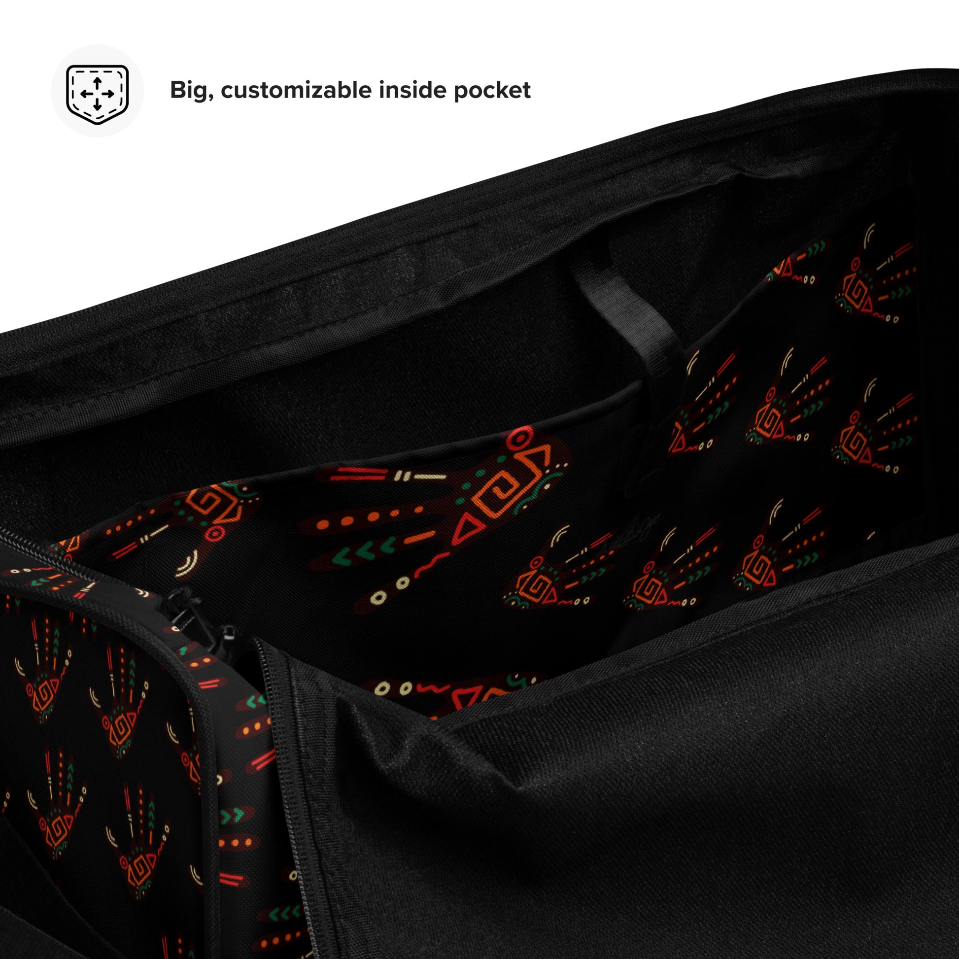 Spacious inside side pocket of Duro Midnight duffle bag; clothed in the custom Tribal Palm Print on black background.