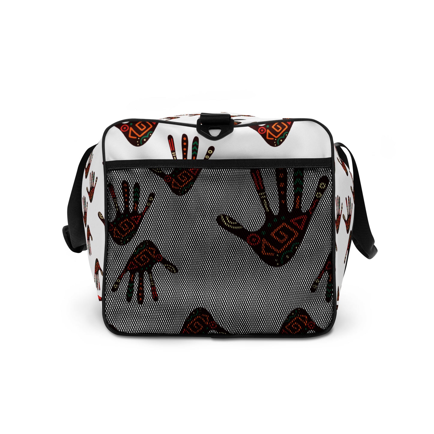 Up close view of external mesh pocket on a white duffle bag, covered with a colorful tribal palm print design, featuring multiple pockets, a black adjustable padded shoulder strap, and dual padded handles.