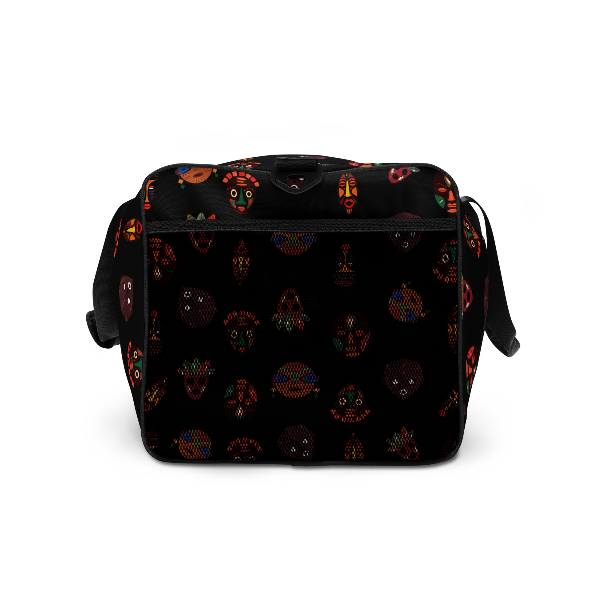 Upclose external mesh pocket side view of Chi Midnight Tribal Mask Duffle Bag.