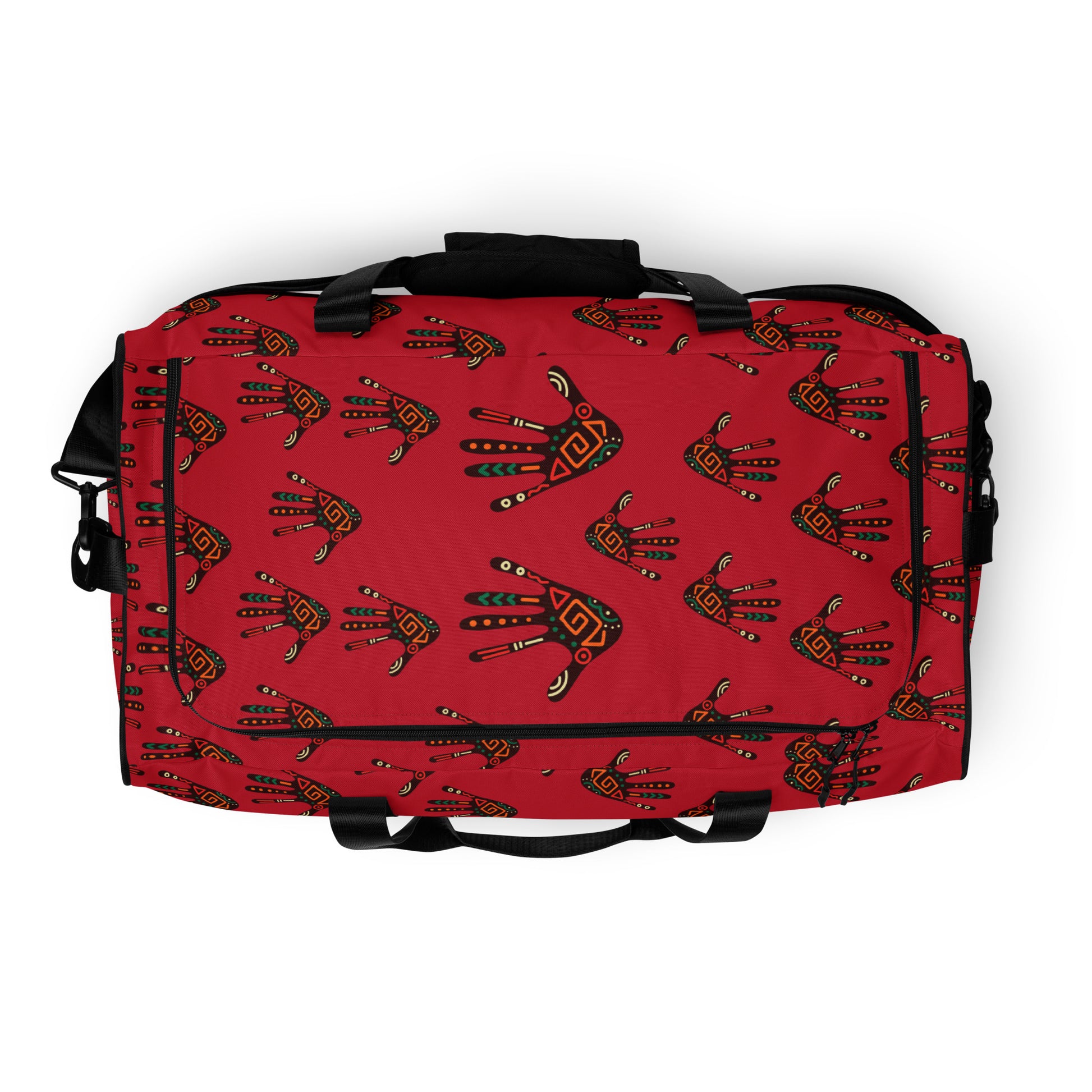Top view of a Duro Crimson Tribal Palm Print Duffle Bag, showing its length-wide, c-shape black zipper closure