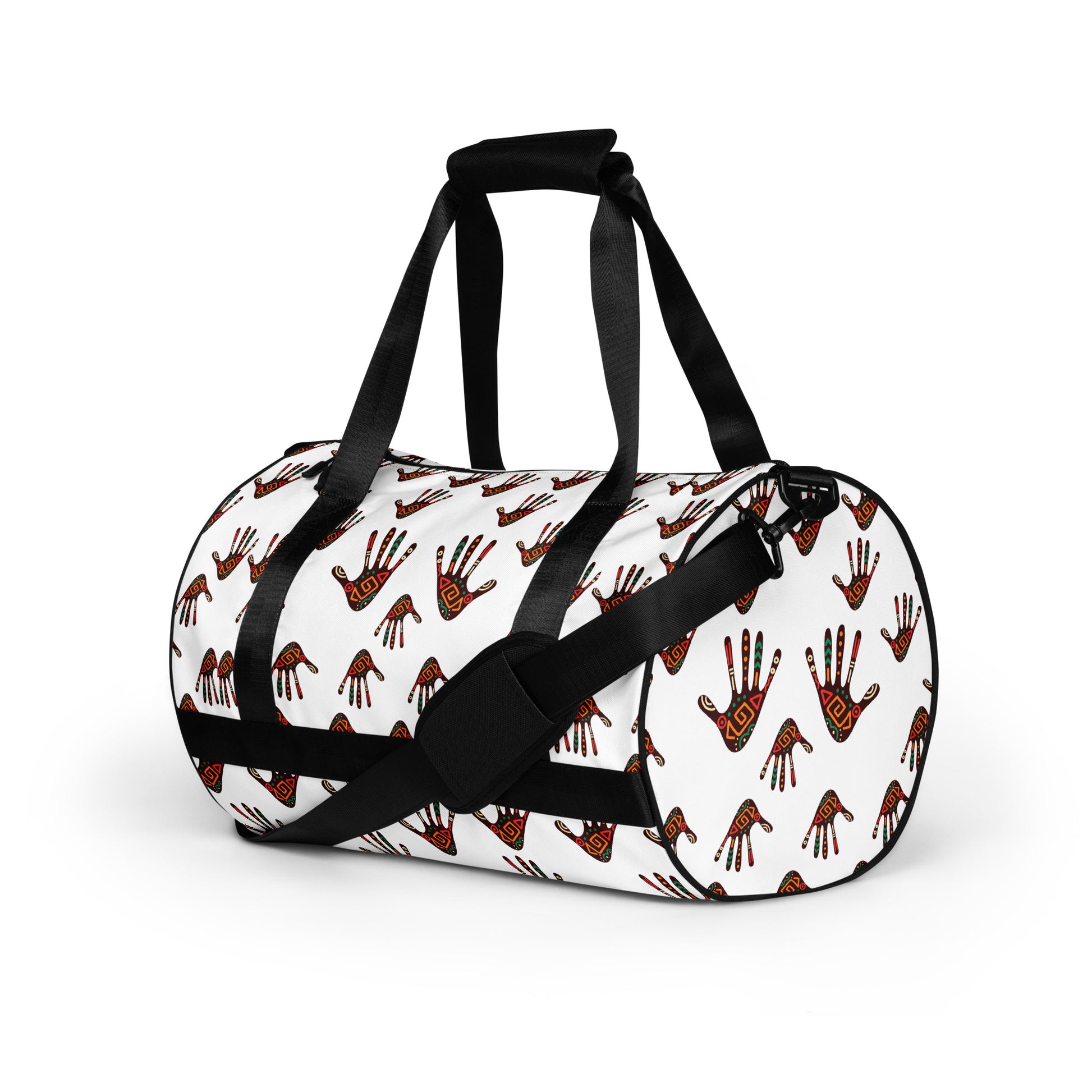 Left side view of Duro Tribal Palm Print Overnight Gym Bag showing the dual small carriers strapped up, while the longer single strap is dropped down and along the front of the bag. 