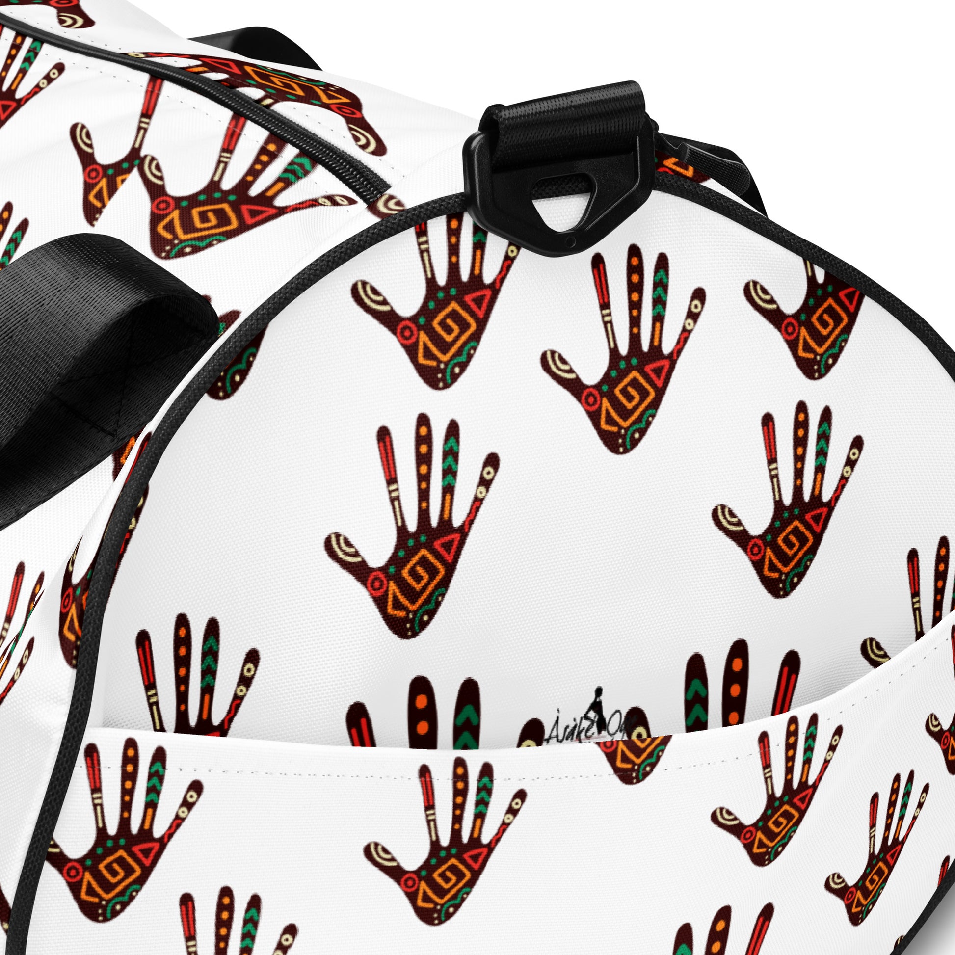 Up close side view of Duro Palm Print Overnight Gym Bag, showing the Asake Oge brand logo and external pocket