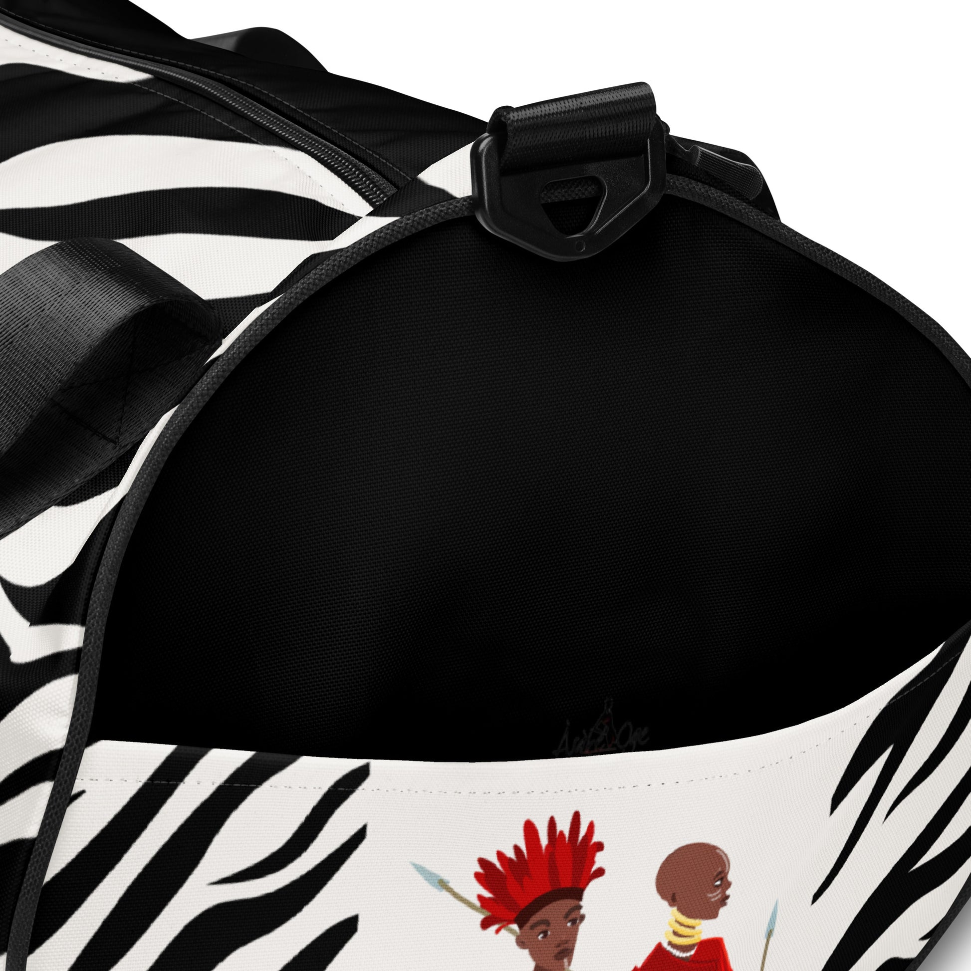 Up close side view of Agojie Zebra Print Overnight Gym Bag, showing the external pocket, zebra print, and warrior heads
