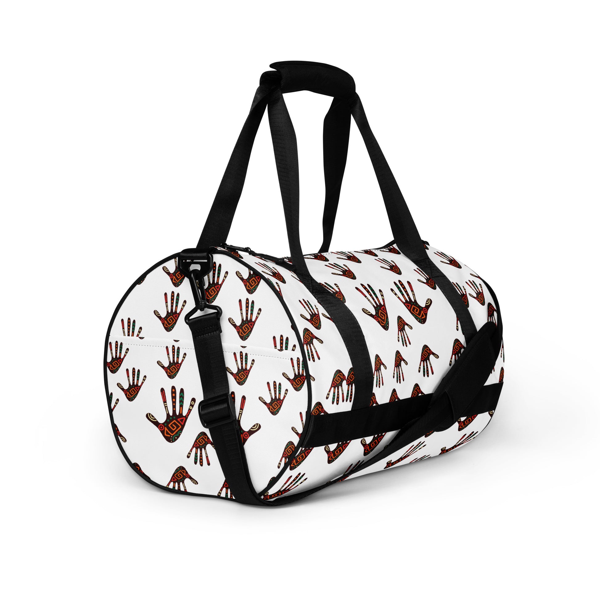 Right side view of Duro Tribal Palm Print Overnight Gym Bag showing the dual small carriers strapped up, while the longer single strap is dropped down and along the front of the bag. 