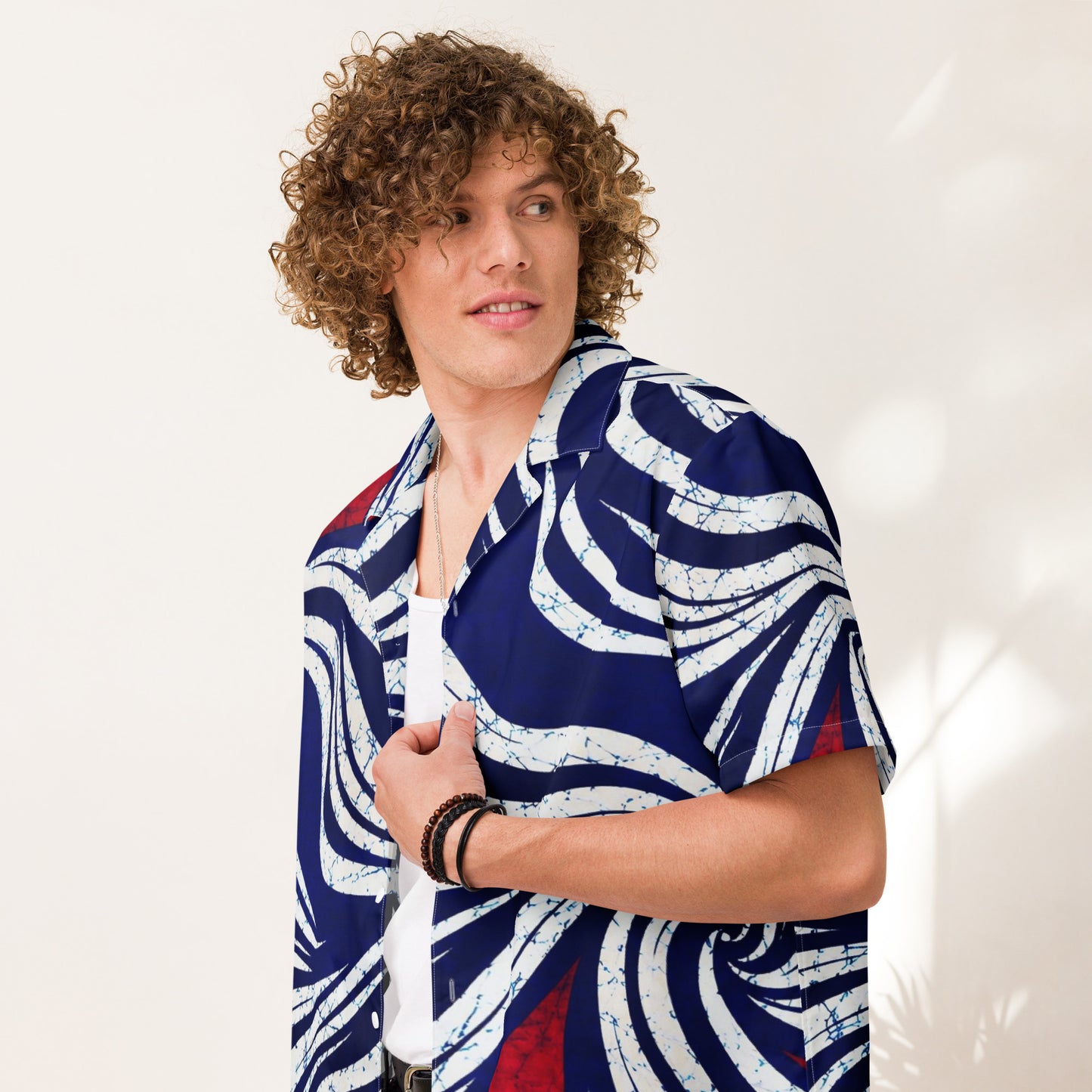 Unisex Juneteenth streetwear styling featuring OMI African print shirt 