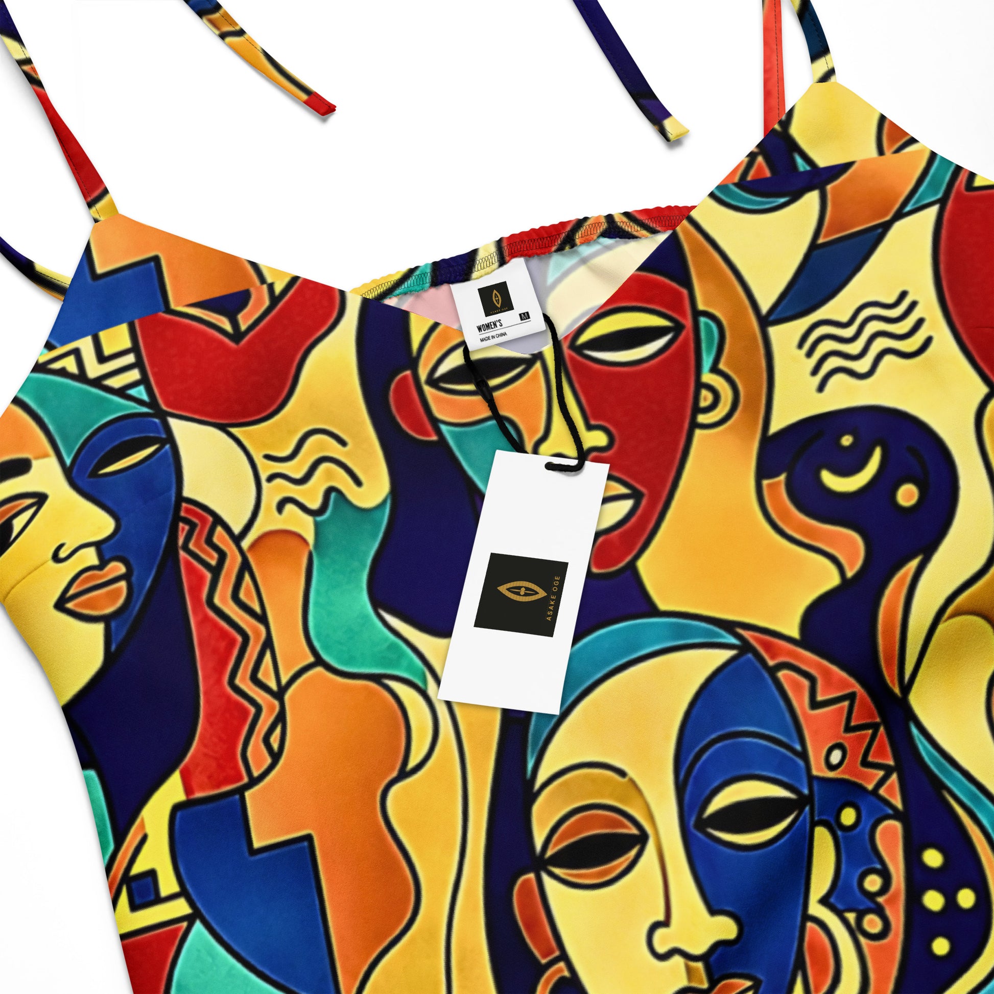 Woman wearing awon aya African print print midi dress by ASAKE-OGE  Juneteenth 2026 collection