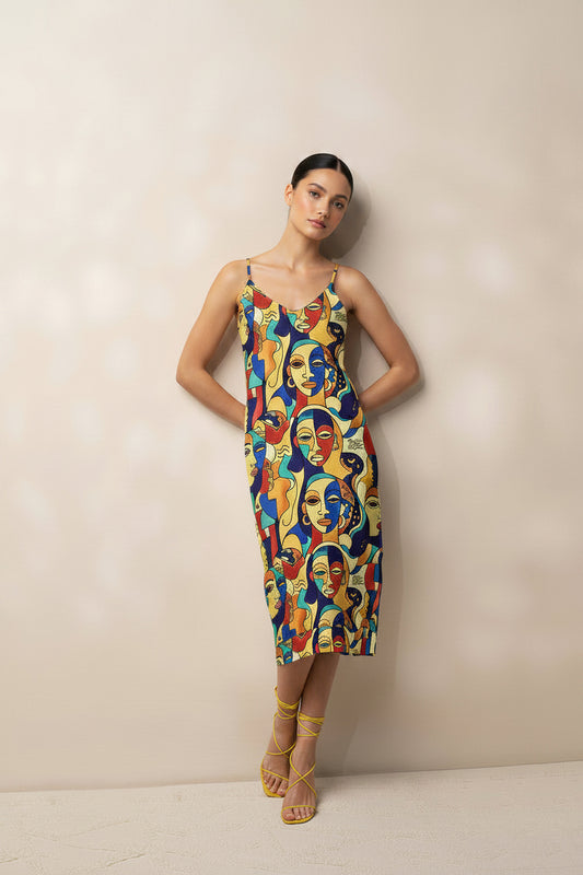Woman wearing awon aya African print print midi dress by ASAKE-OGE  Juneteenth 2026 collection