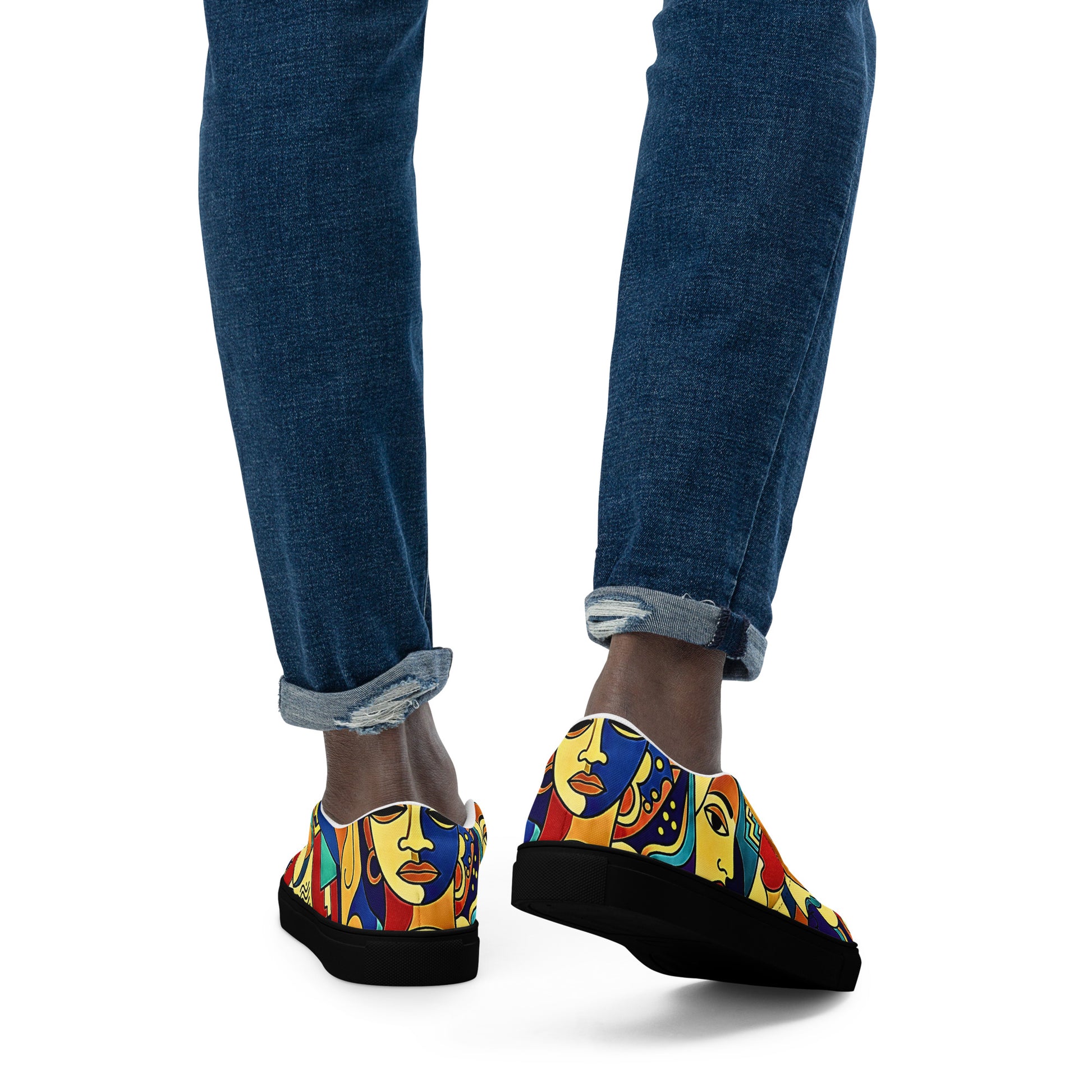 Man wearing African print slip-on canvas shoes for Juneteenth streetwear 