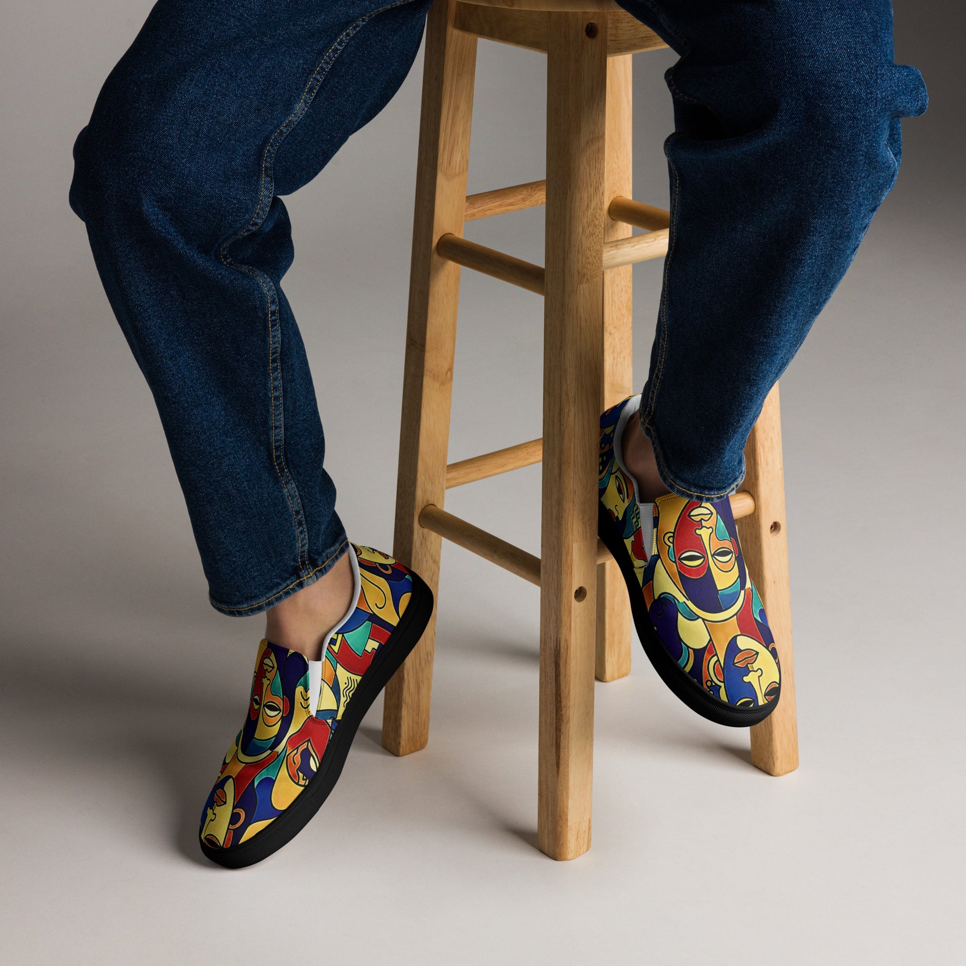 Man wearing African print slip-on canvas shoes for Juneteenth streetwear 