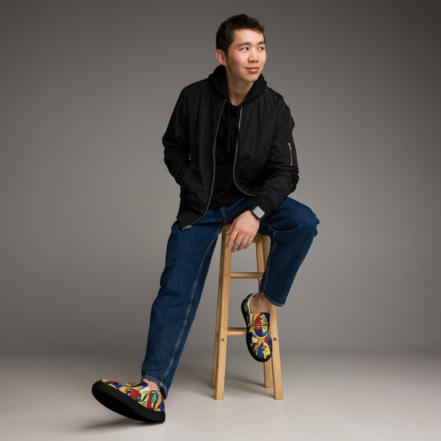 Man wearing African print slip-on canvas shoes for Juneteenth streetwear