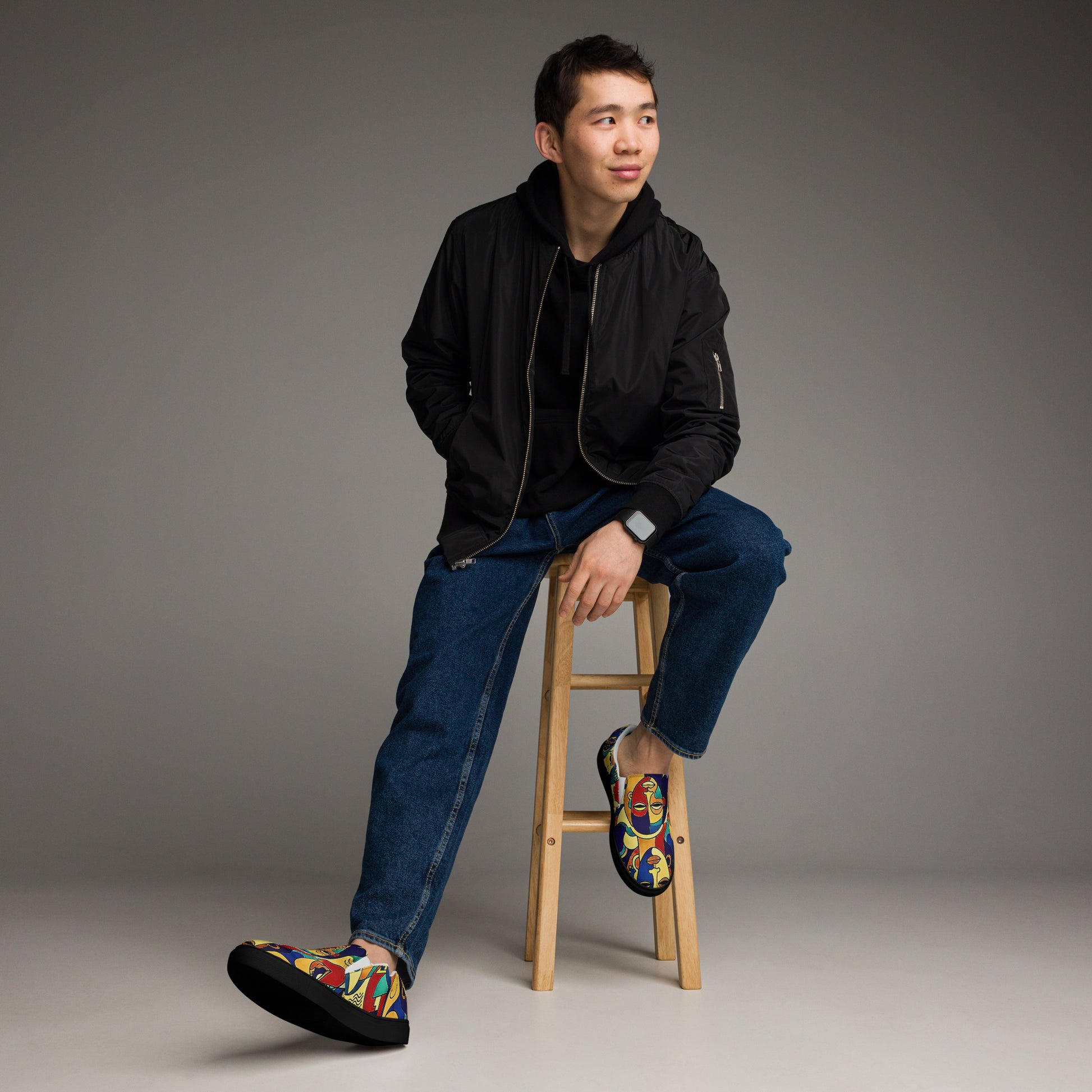 Man wearing African print slip-on canvas shoes for Juneteenth streetwear