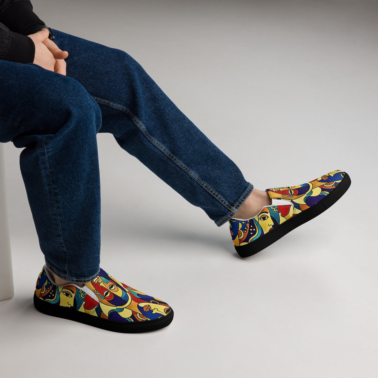 Man wearing African print slip-on canvas shoes for Juneteenth streetwear 
