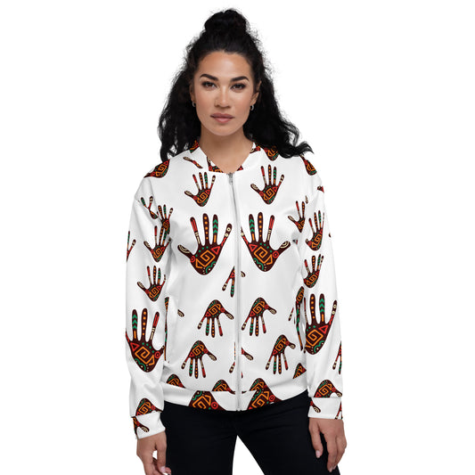 A woman wearing a white unisex bomber jacket with a colorful geometric pattern.