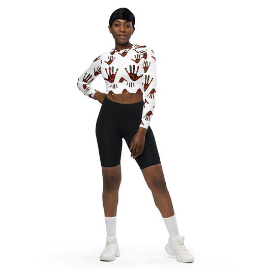 A woman wearing African Print Women's Long Sleeve Crop Top: Recycled UPF50+ | ASAKE-OGE