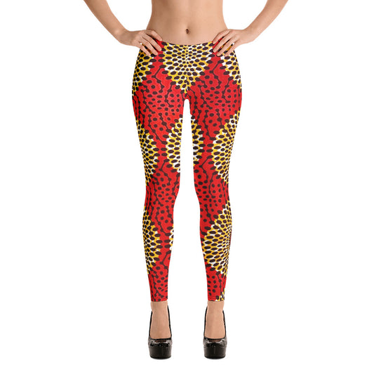 Front view of woman wearing vibrant colored, geometric-pattern Rekiana African print athleisure sport leggings