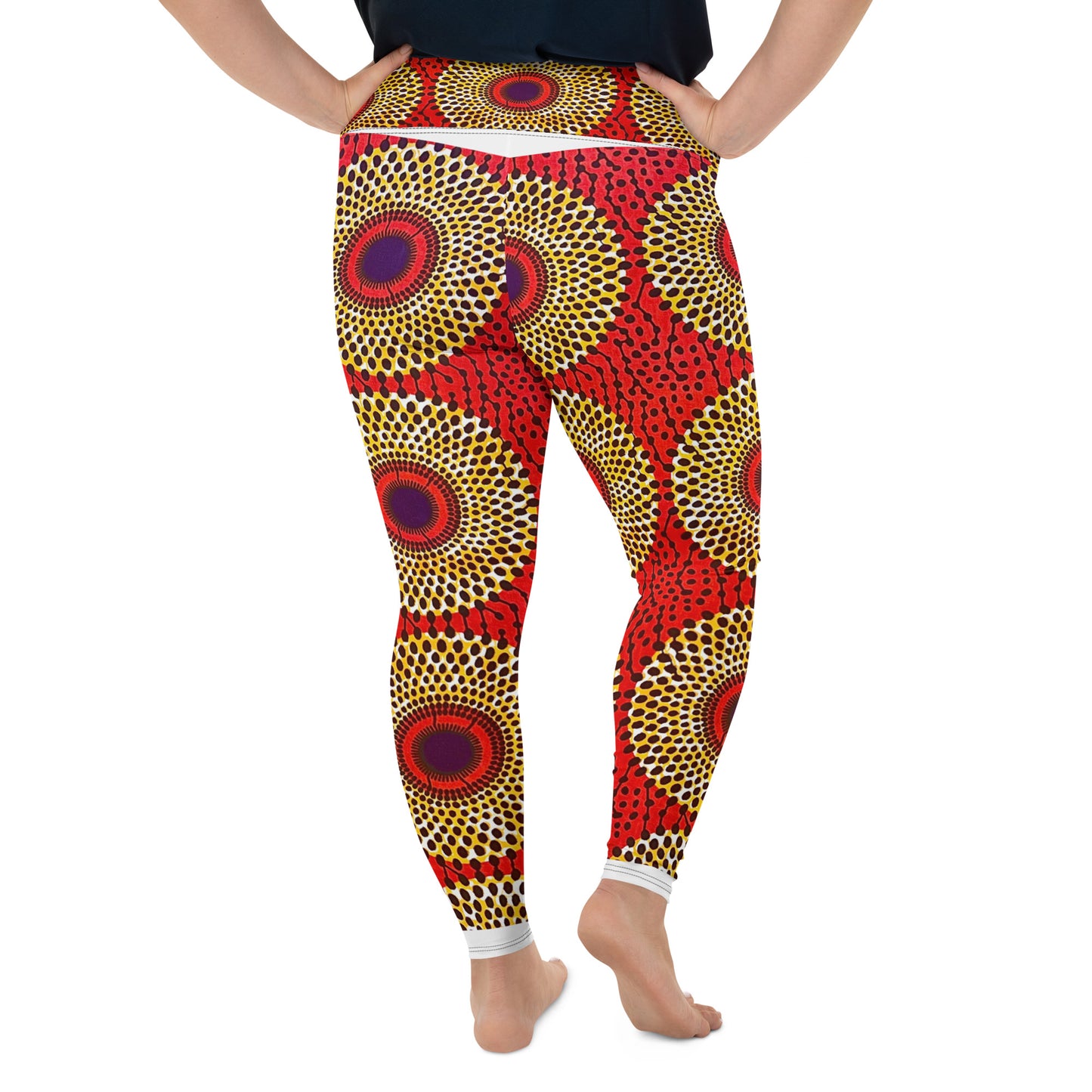 Back view of woman wearing vibrant colored, geometric-pattern Rekiana Ankara print plus-size leggings