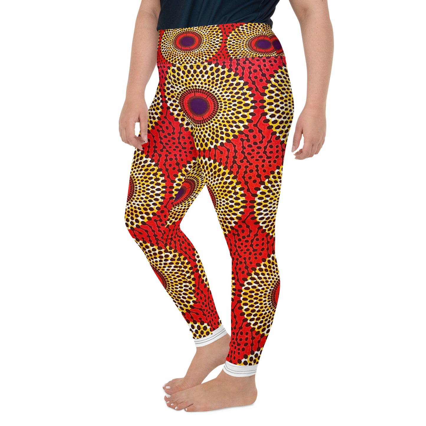 Side view of woman wearing vibrant colored, geometric-pattern Rekiana Ankara print plus-size leggings