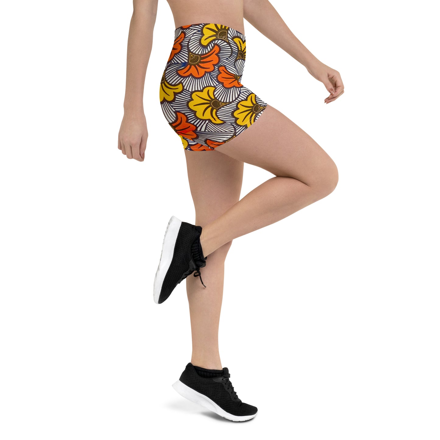 Side view of woman wearing Adun ankara print sports Shorts