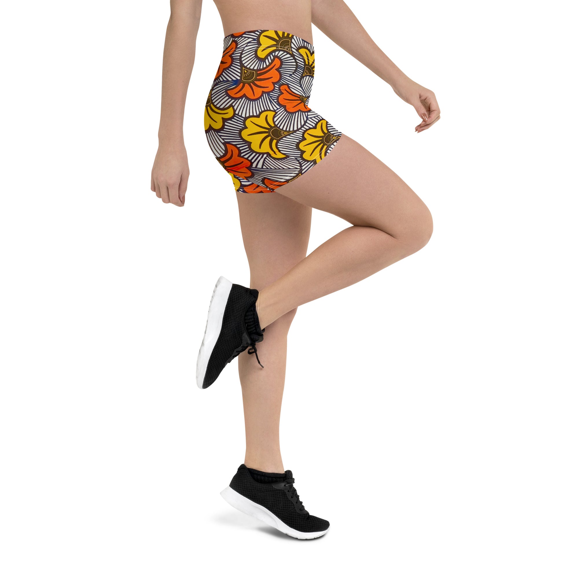 Side view of woman wearing Adun ankara print sports Shorts