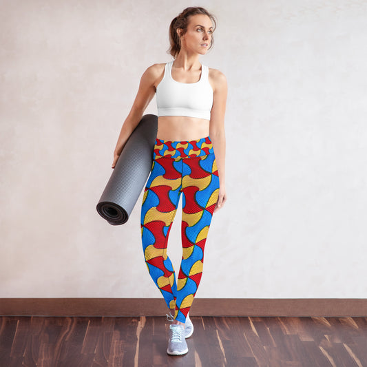 Woman holding a yoga mat while wearing Santi Ankara Print Leggings with a tank top and sneakers