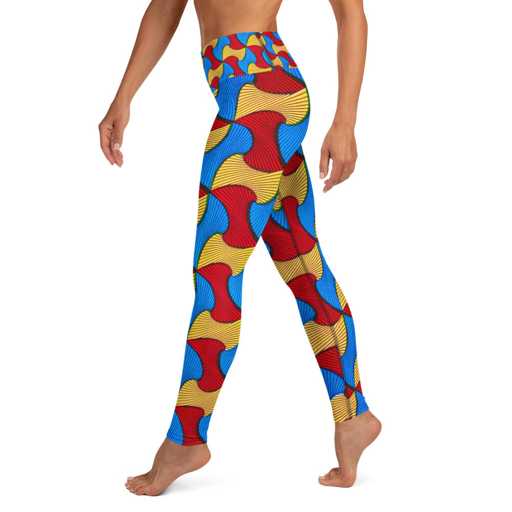 Side view of woman walking; wearing Santi Ankara Print leggings