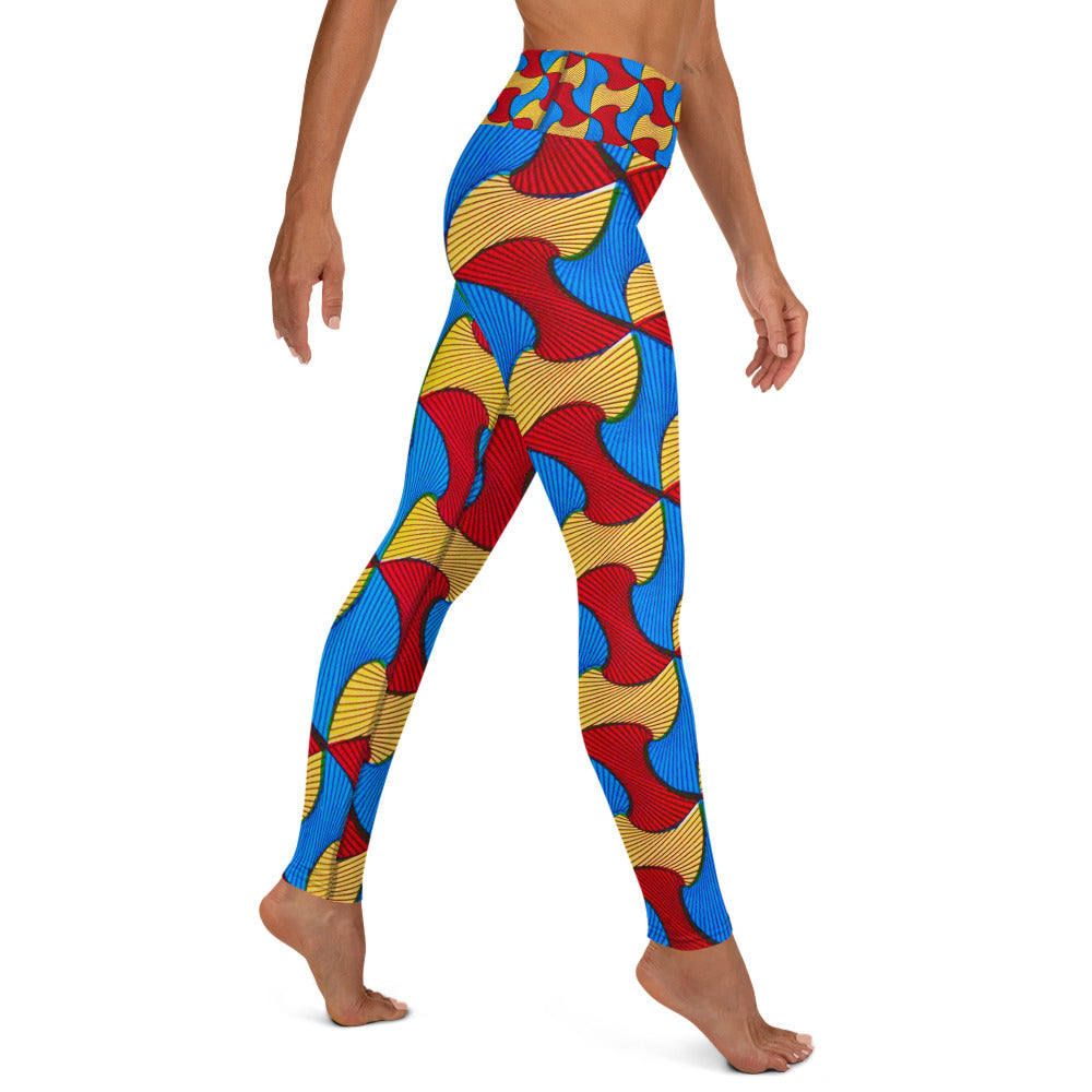 Side view of woman walking; wearing Santi Ankara Print leggings